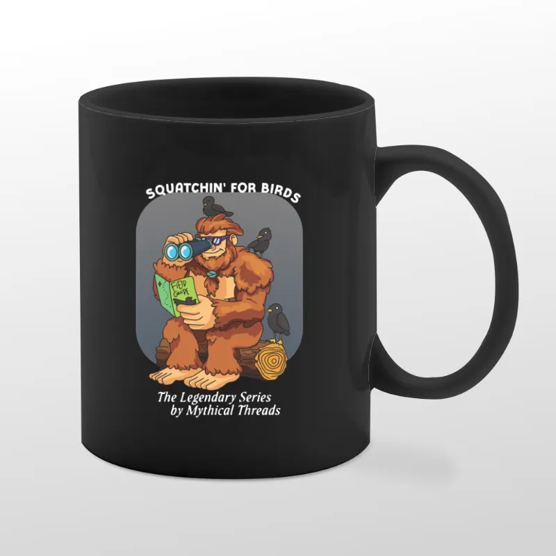 Black mug with Bigfoot birdwatching graphic