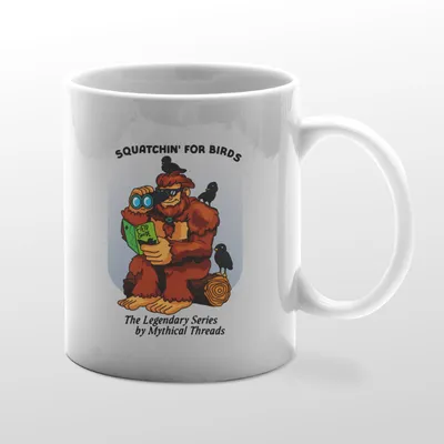 White mug with Bigfoot birdwatching graphic