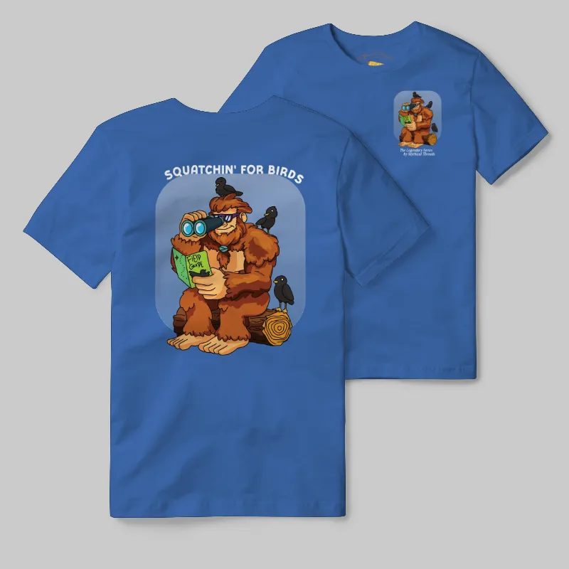 Light Blue T-shirt with Bigfoot birdwatching graphic