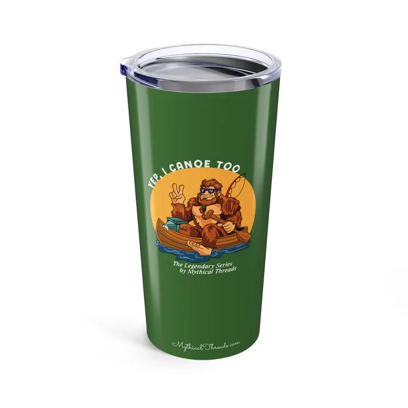 Forest green tumbler with Bigfoot canoeing graphic