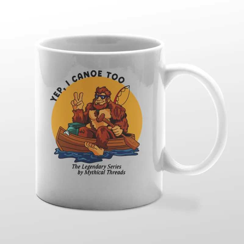 White mug with Bigfoot canoeing graphic