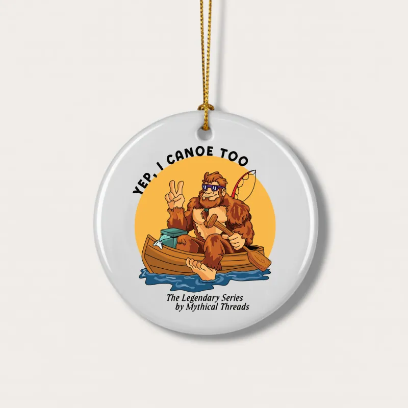 White mug with Bigfoot canoeing graphic