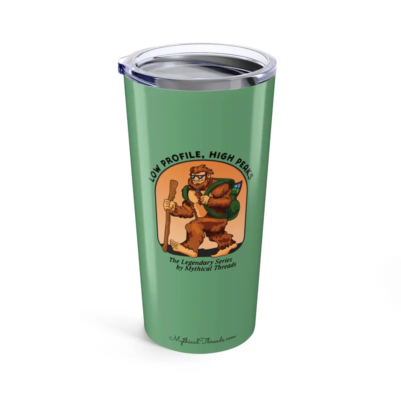 Sage green tumbler with Bigfoot hiking graphic