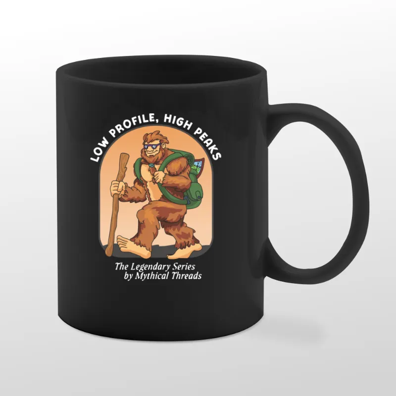 Black mug with Bigfoot hiking graphic