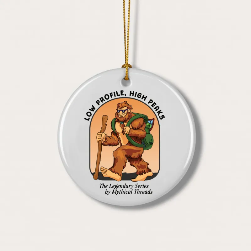 White mug with Bigfoot hiking graphic