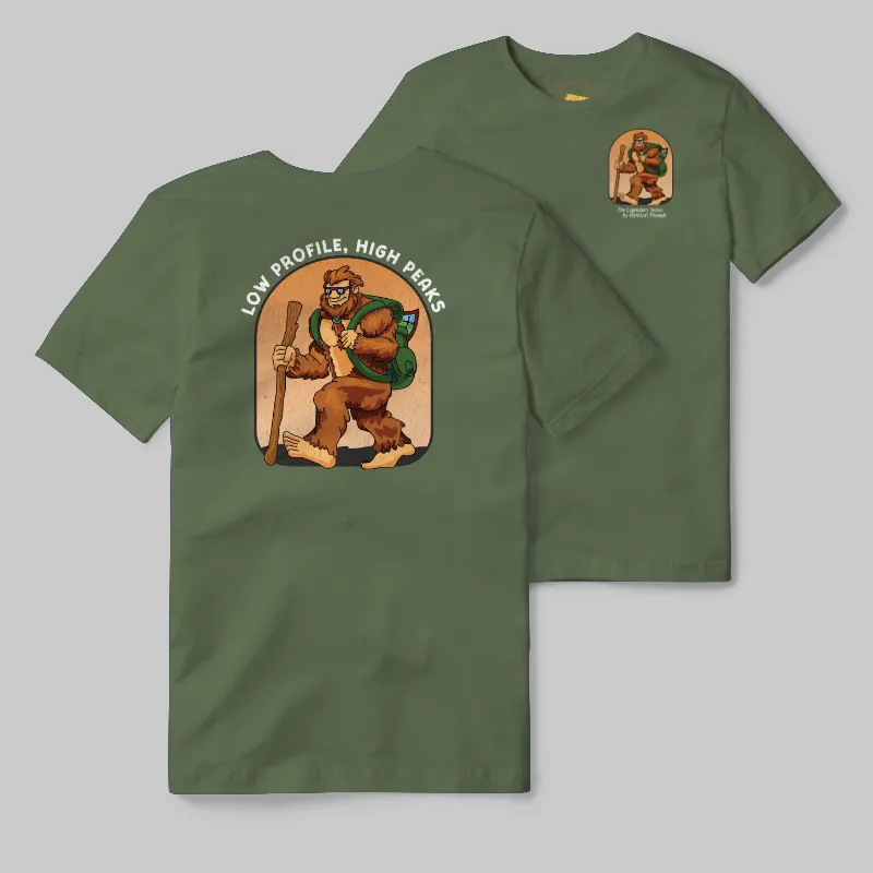 Olive T-shirt with Bigfoot hiking graphic