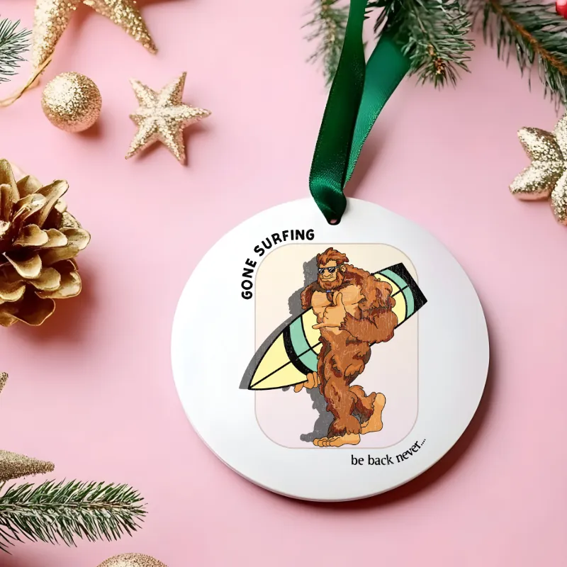 White mug with Bigfoot walking with his surfboard graphic