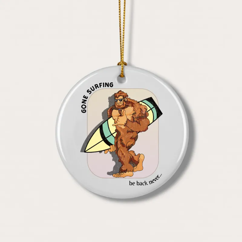 White mug with Bigfoot walking with his surfboard graphic