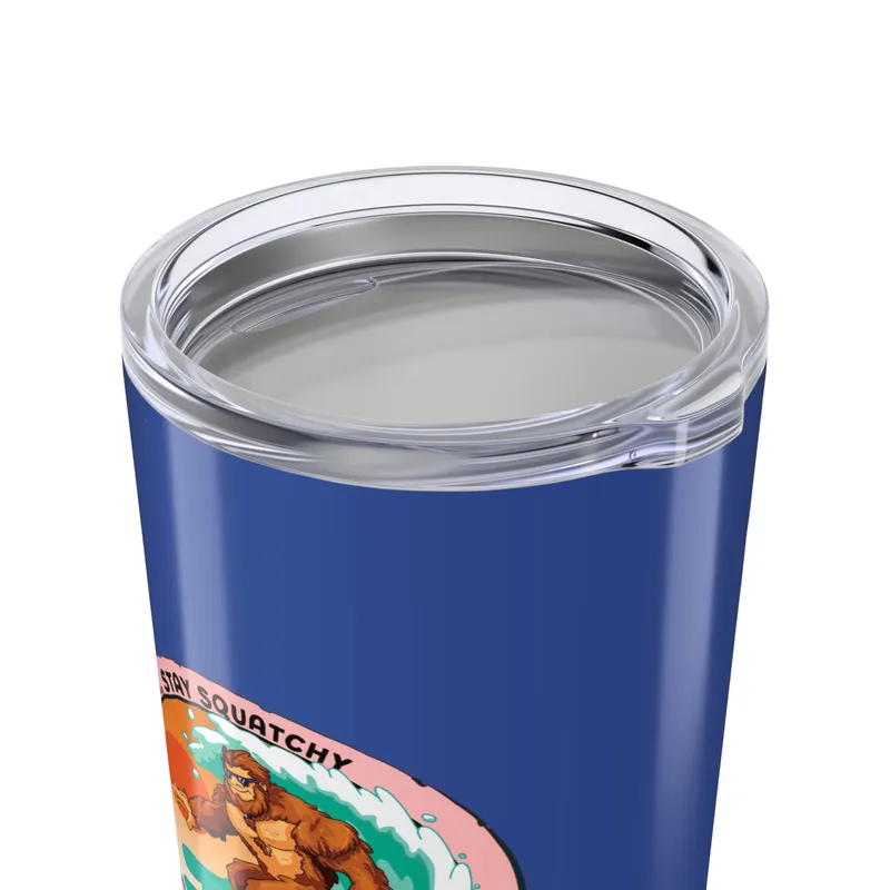 Deep ocean blue tumbler with Bigfoot surfing graphic