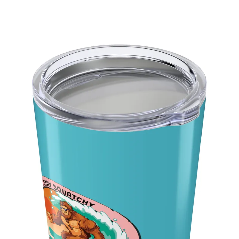 Aqua blue tumbler with Bigfoot surfing graphic