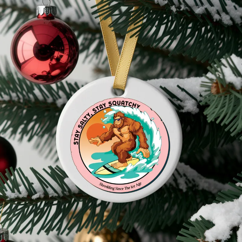 White mug with Bigfoot surfing graphic