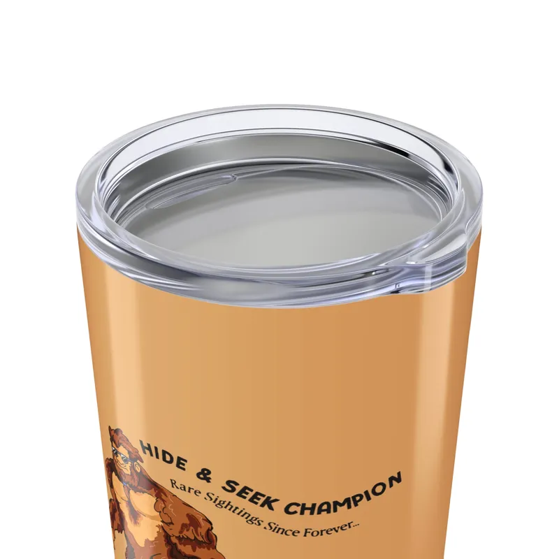 Golden tan tumbler with Bigfoot walking graphic
