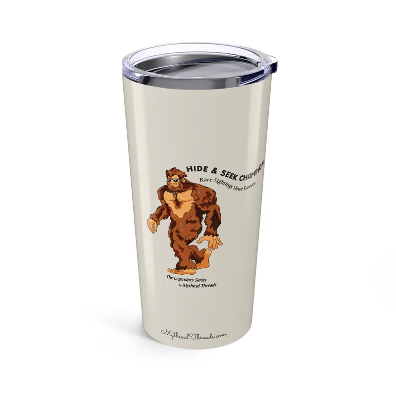 Warm stone tumbler with Bigfoot walking graphic