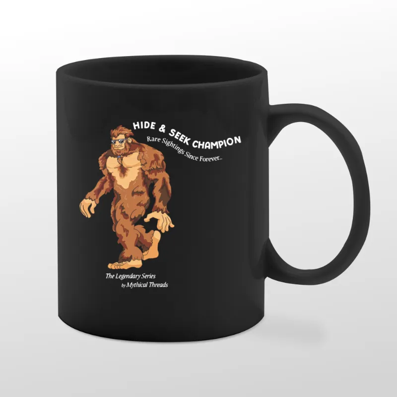 Black mug with Bigfoot walking graphic