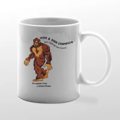 White mug with Bigfoot walking graphic