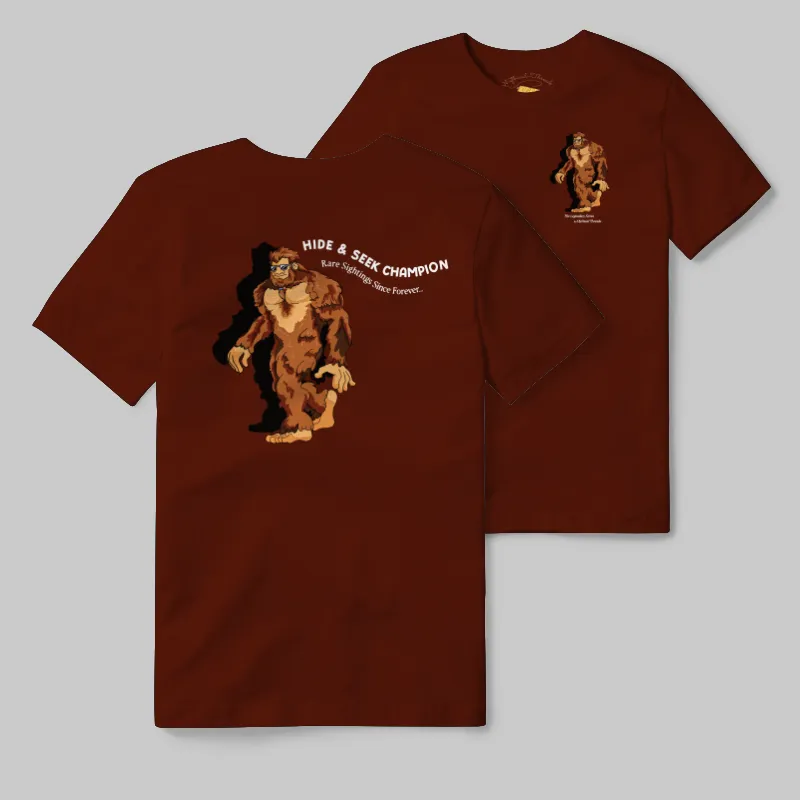 Maroon T-shirt with Bigfoot walking graphic